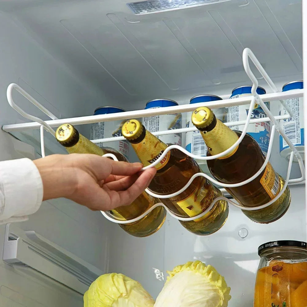 Fridge door and shelf storage rack holding beer and wine bottles