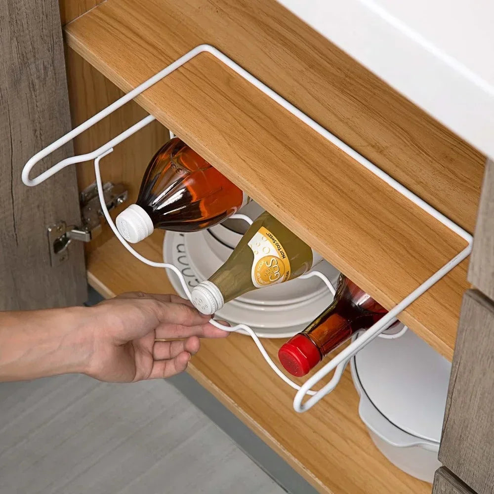 Fridge storage rack installed holding multiple beverage bottles